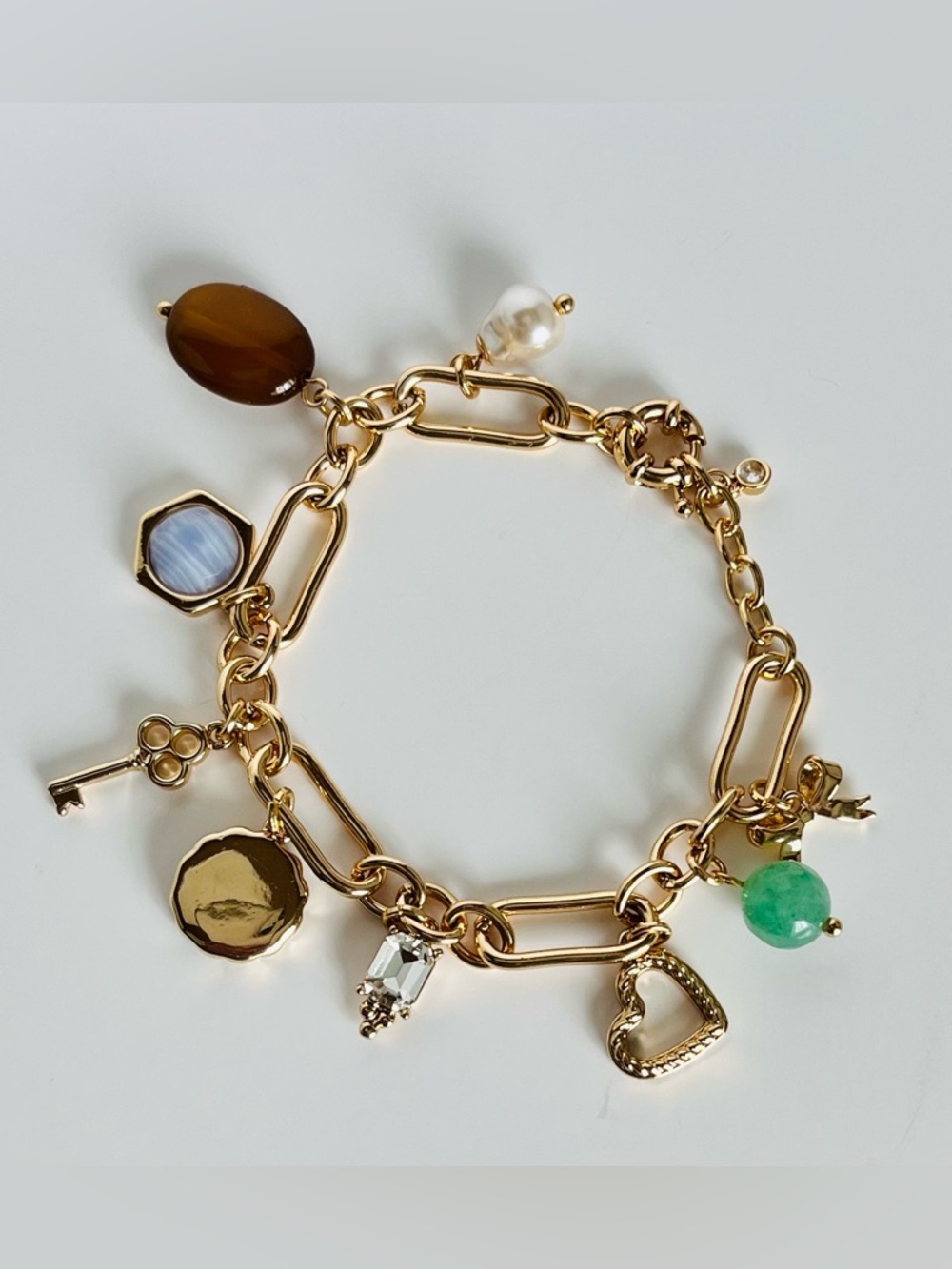 On 34th Gold Tone Charm Bracelet